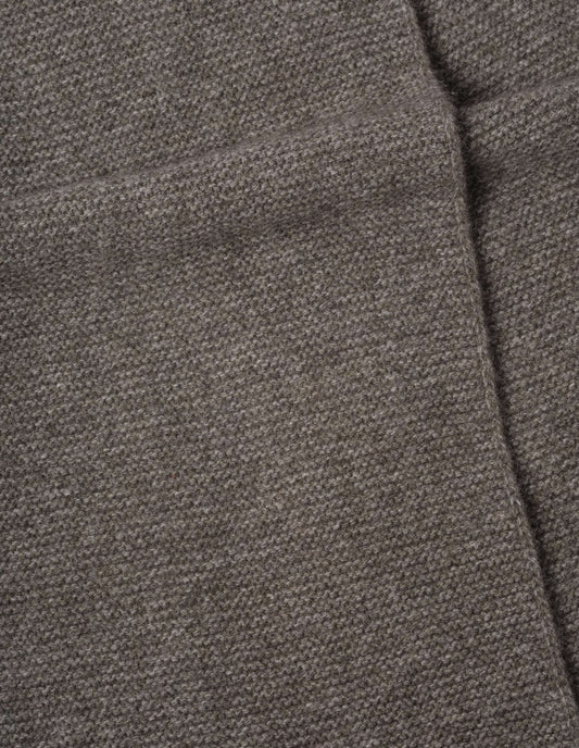 Beige brown textured knitted yak, wool and cashmere scarf, fabric swatch.