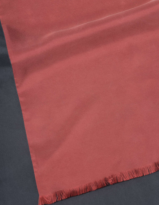Red and grey screen printed silk scarf fabric swatch.