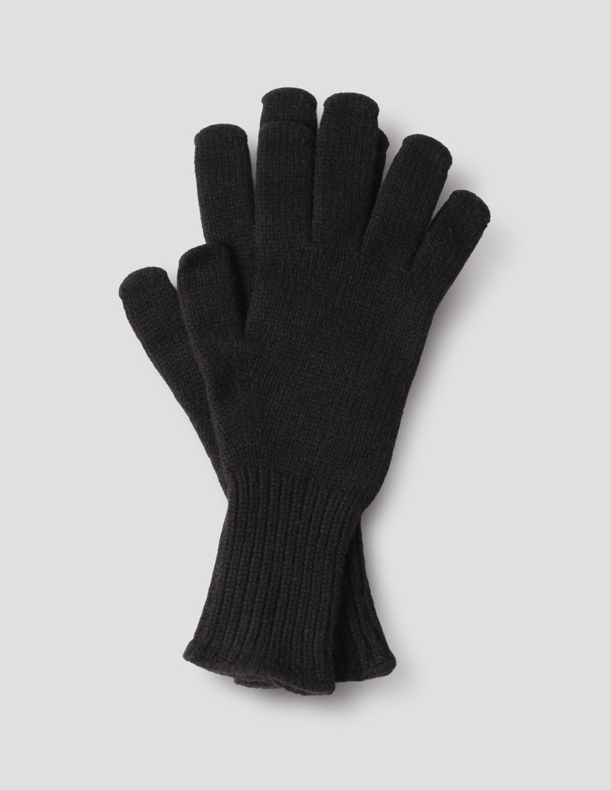 Black cashmere merino knitted gloves with contrasting rib cuffs. Front flat lay view.