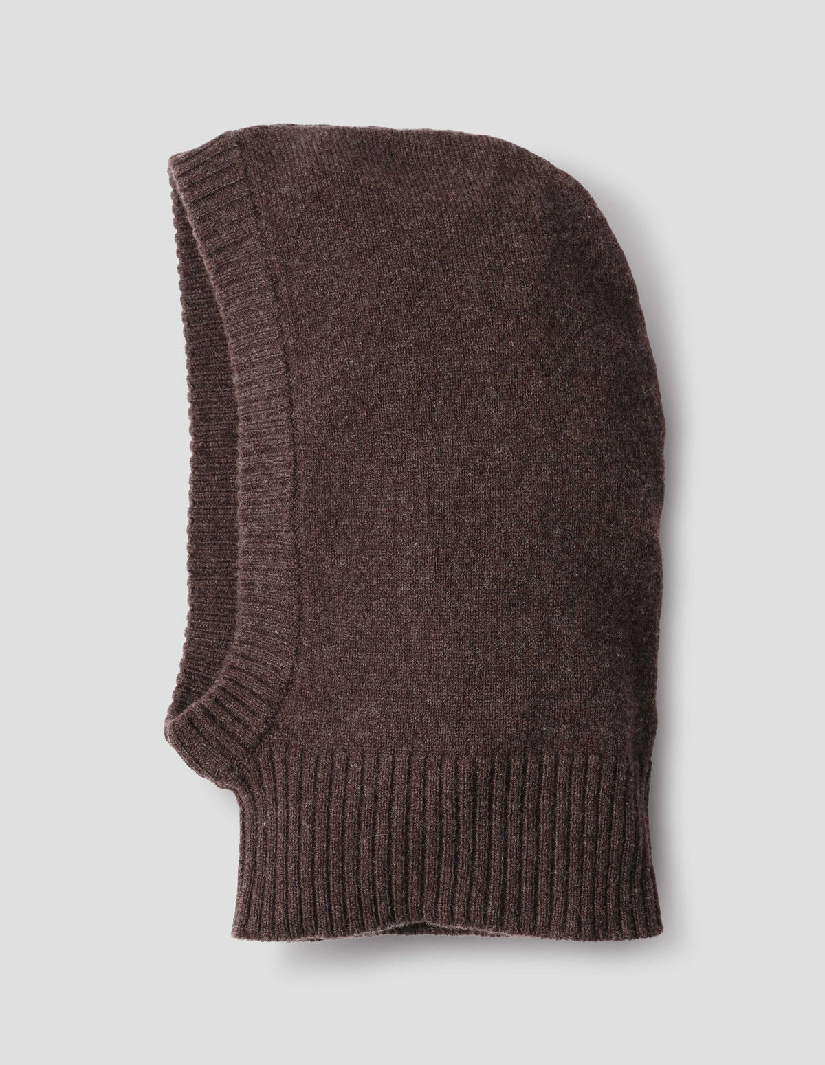 Brown felted knit lambswool hood with contrasting rib on face and neck, side flat lay view.