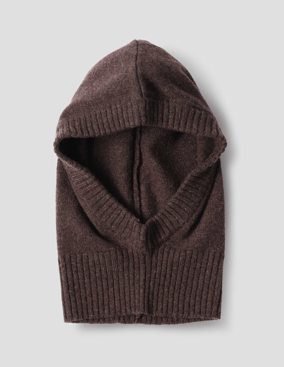 Brown felted knit lambswool hood with contrasting rib on face and neck, front flat lay view.