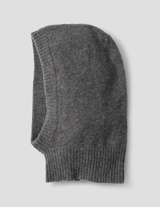 Grey felted knit lambswool hood with contrasting rib on face and neck, side flat lay view.