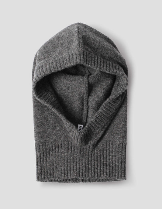 Grey felted knit lambswool hood with contrasting rib on face and neck, front flat lay view.