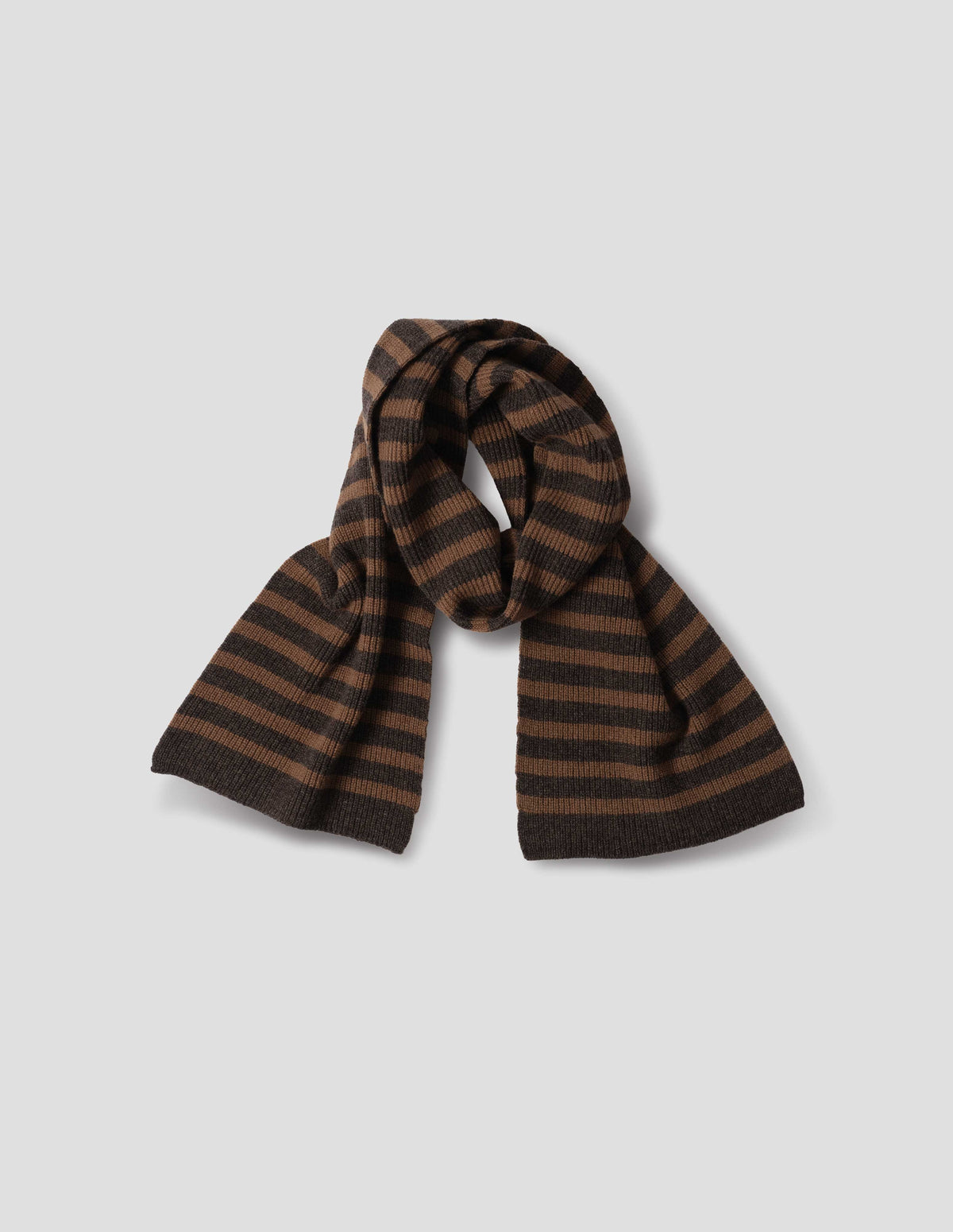 Dark brown and light brown knitted wool striped scarf, front flat lay view.