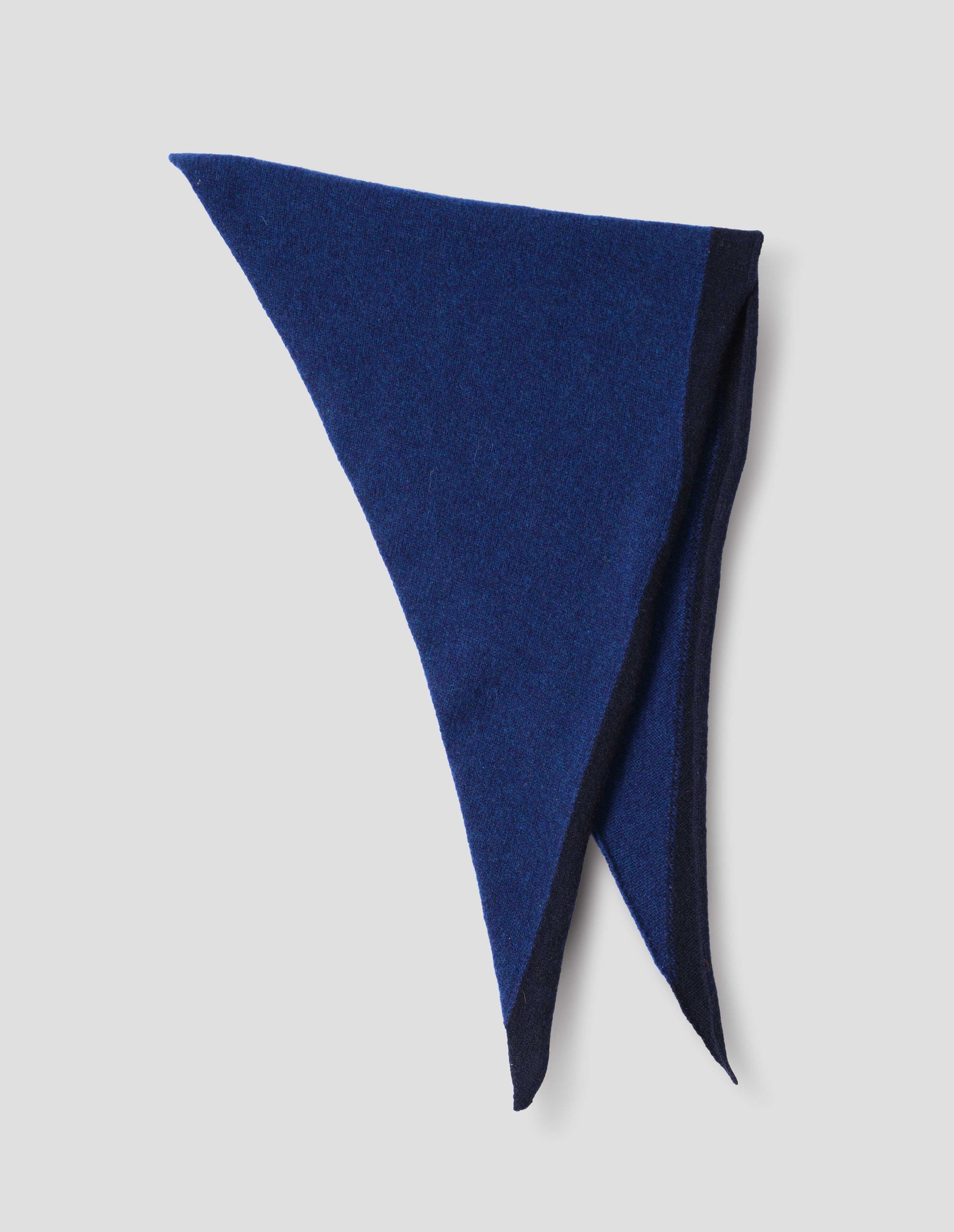 Blue wool scout scarf with dark navy wool trim, alternate flat lay view of scarf folded in half.