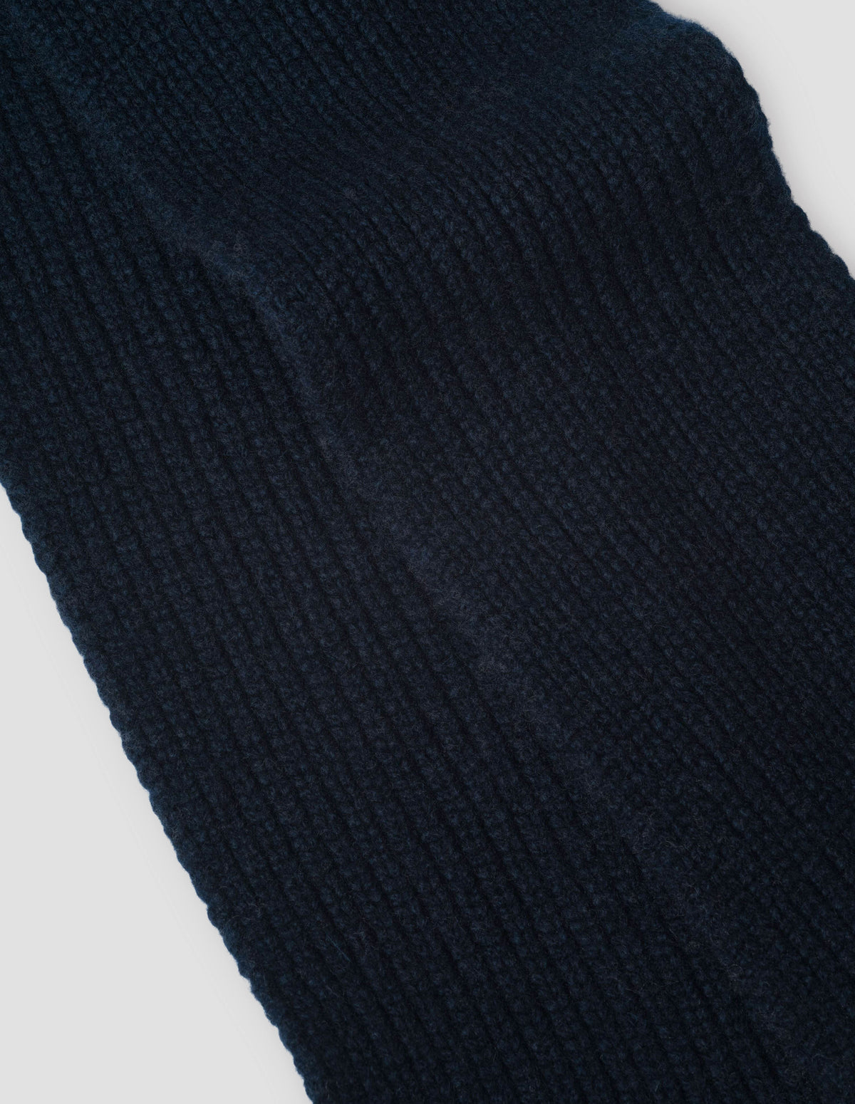 Dark navy knitted chain cashmere ribbed scarf, fabric swatch.