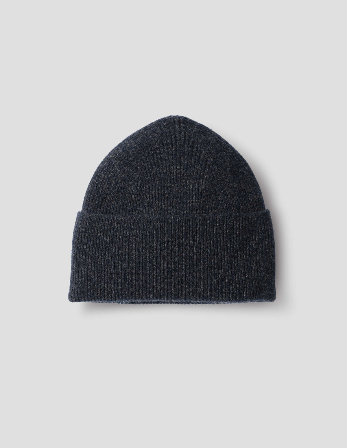 Dark blue merino cashmere knitted ribbed beanie with contrasting grey flecks. Front flat lay view. 