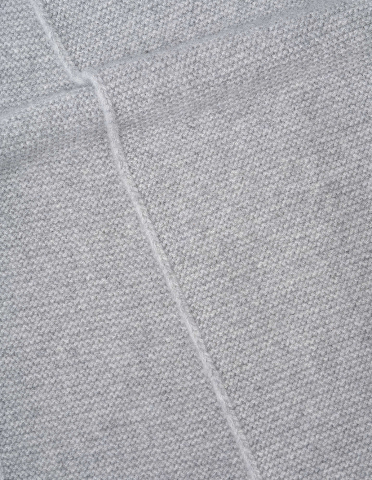 Light grey merino cashmere knitted scarf fabric swatch.