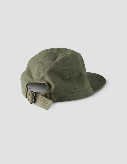 Khaki green soft peak cap with contrast herringbone tape slide adjustor detailing. Back view flat lay.