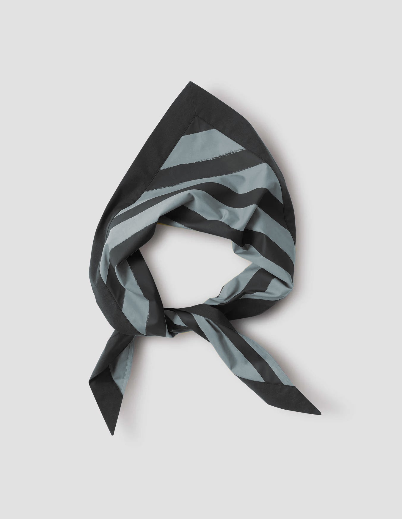 Greyish blue and dark blue striped cotton scout scarf, with contrasting block border. Front flat lay view.