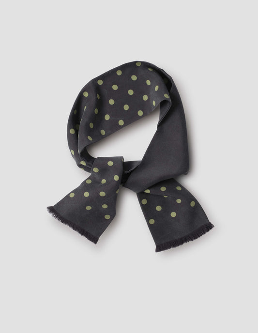Black silk scarf with light green spots. Front flat lay view.