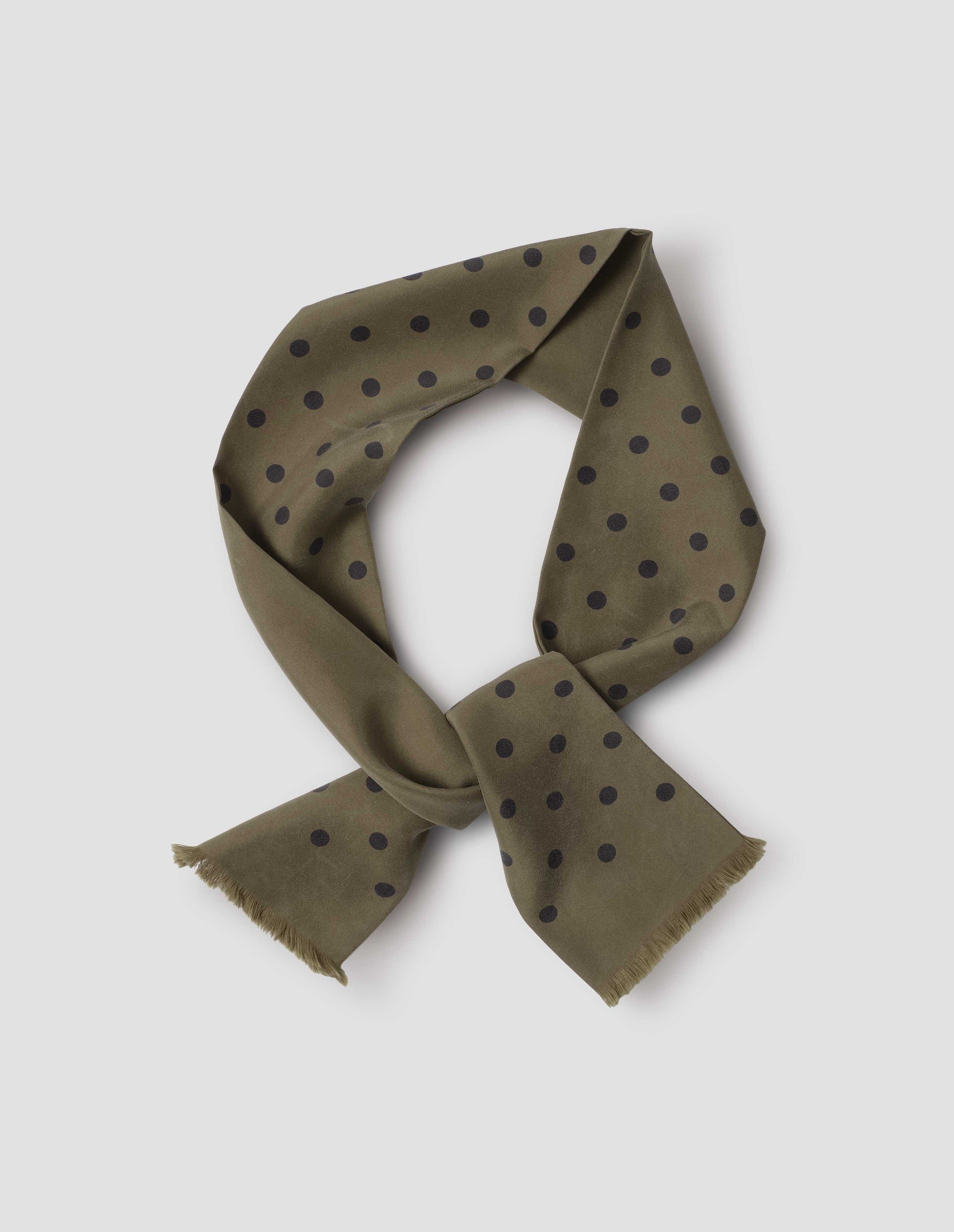 Brownish green silk scarf with black spots. Front flat lay view.