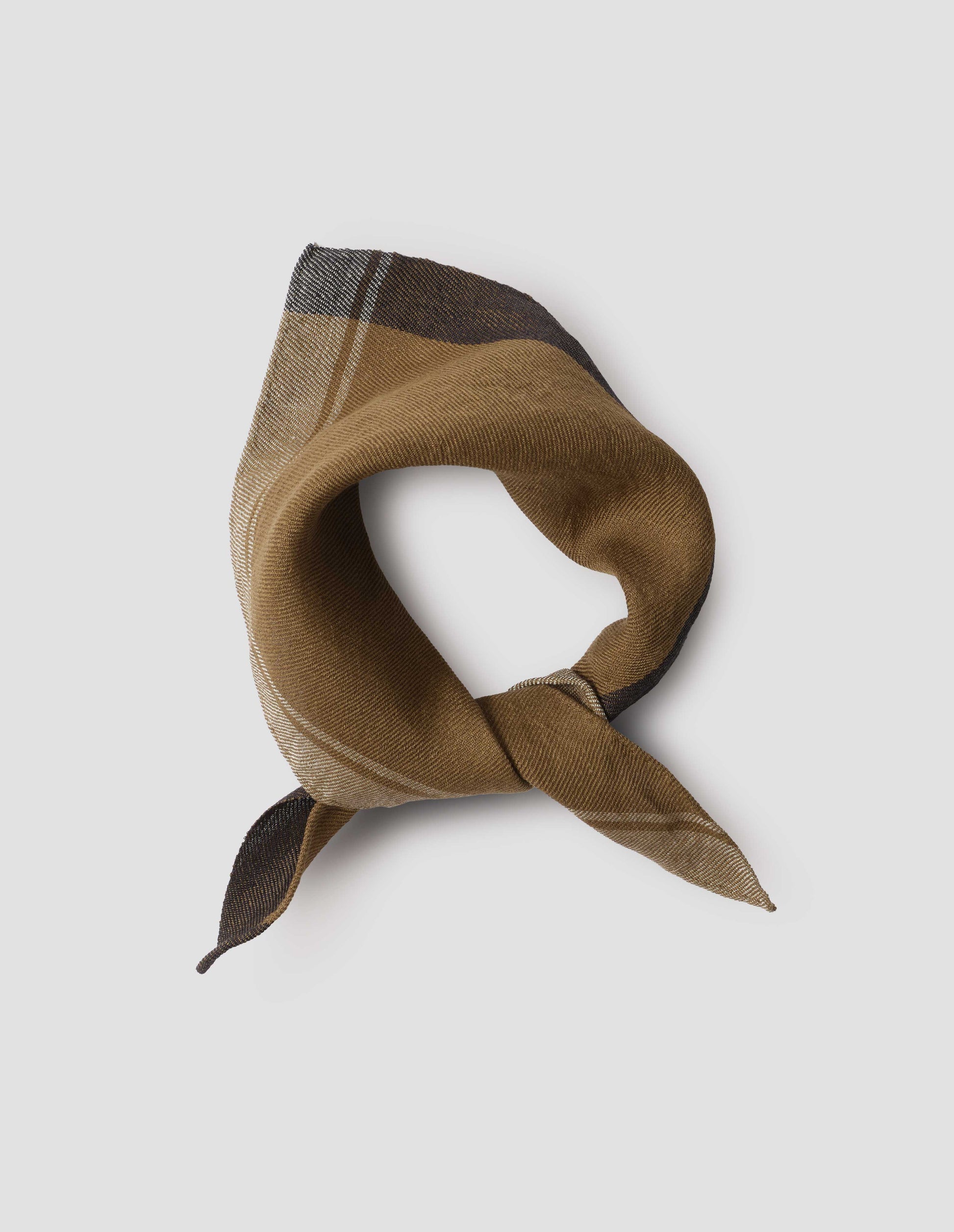 Brown, white and black textured linen scout scarf with check detailing, front flat lay view.