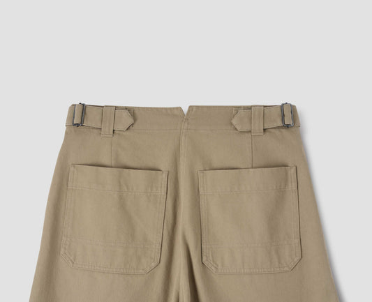 Beige trousers with side cinch adjusters on waistband and back patch pockets. Back flat lay view. 