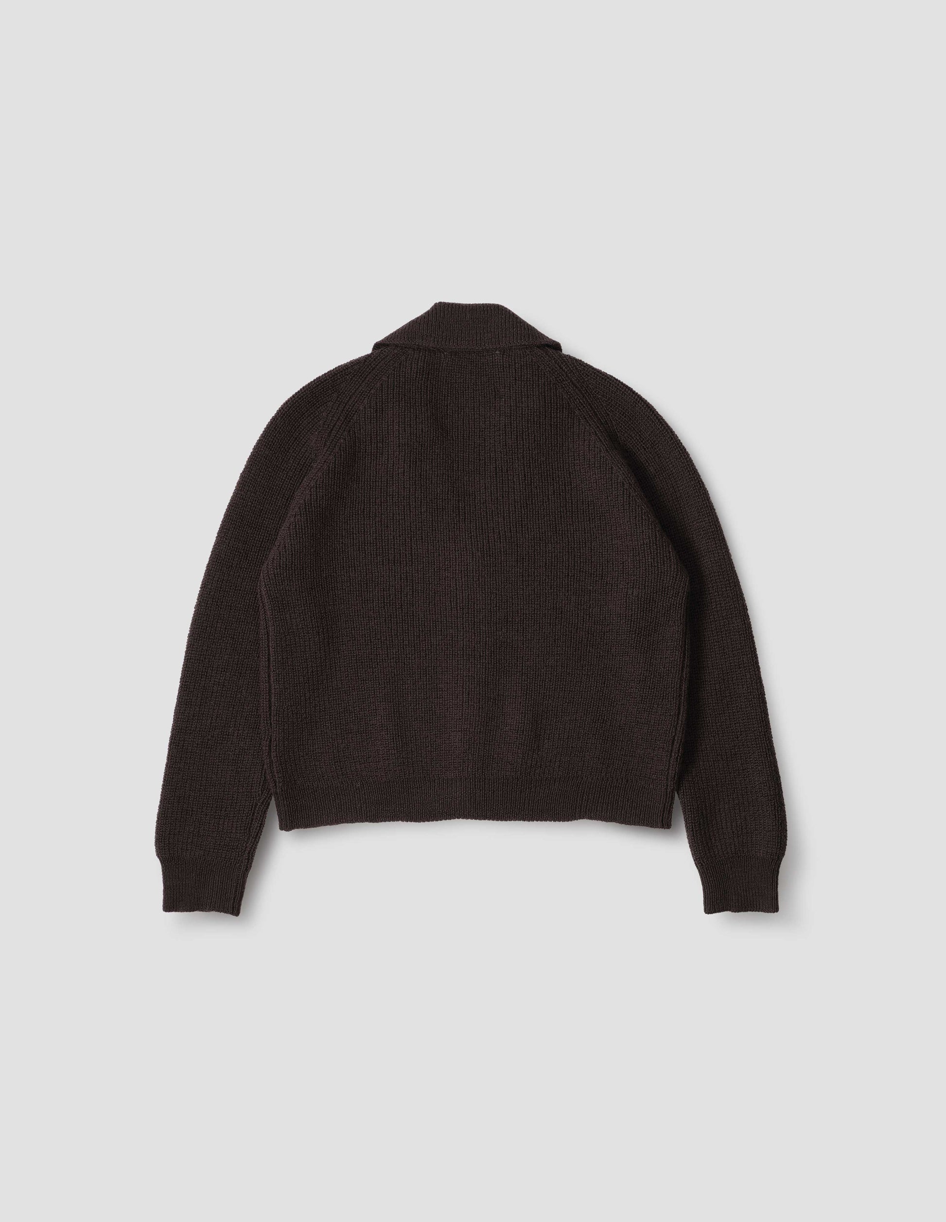 Brown wool collared cardigan with raglan sleeve, contrast rib on collar, placket and hem. Back flat lay view.