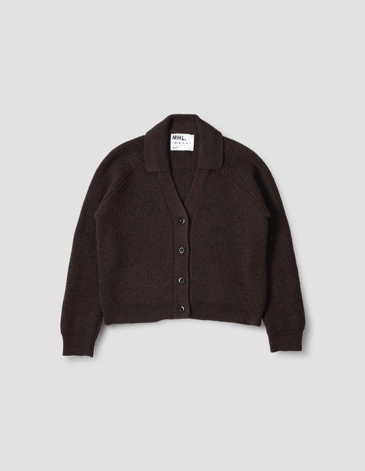 Brown wool collared cardigan with raglan sleeve, contrast rib on collar, placket and hem and corozo brace button closure. Front flat lay view.
