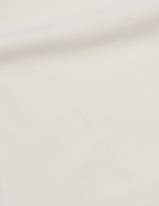 Off white dry cotton gabardine trousers, fabric swatch.