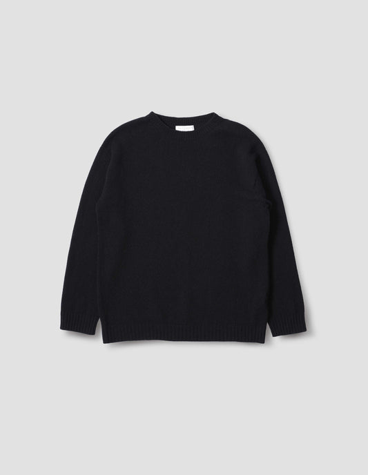 Black merino cashmere bed jumper with raglan sleeve and contrast rib on neck, cuffs and hem, Front flat lay view.