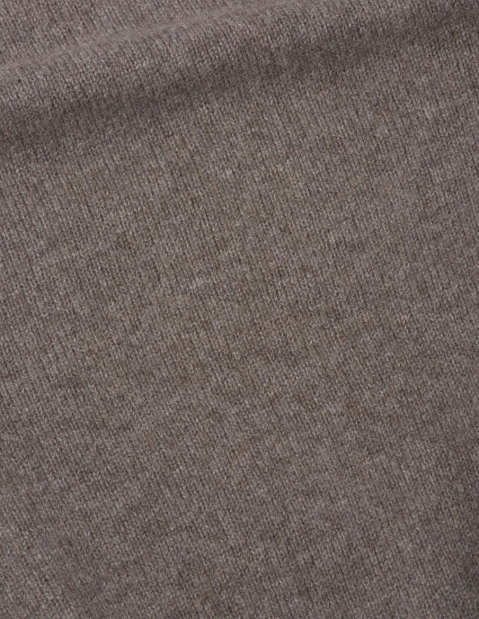 Greyish beige jumper cashmere fabric swatch. 