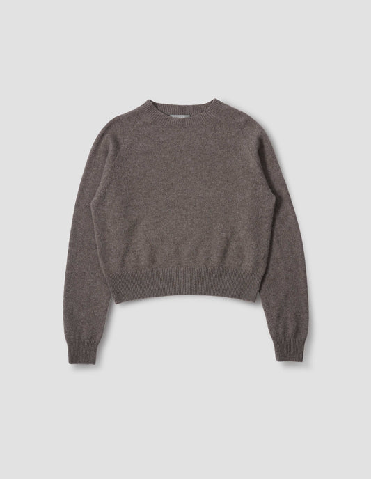 Greyish beige jumper with raglan sleeve, contrast rib on neck, cuffs and hem. Front flat lay view.