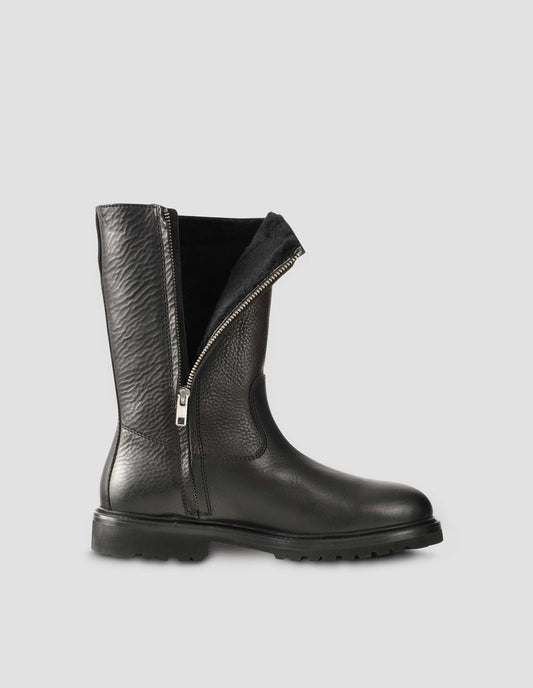 Black leather three quarter length boot with side zip, Vibram sole and shearling lining. Side view to display zip undone flat lay.