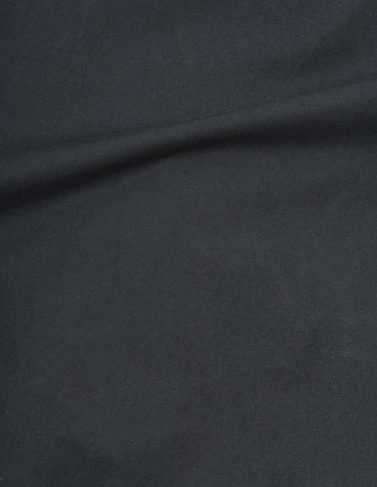 Black dry wax cotton gilet fabric swatch.