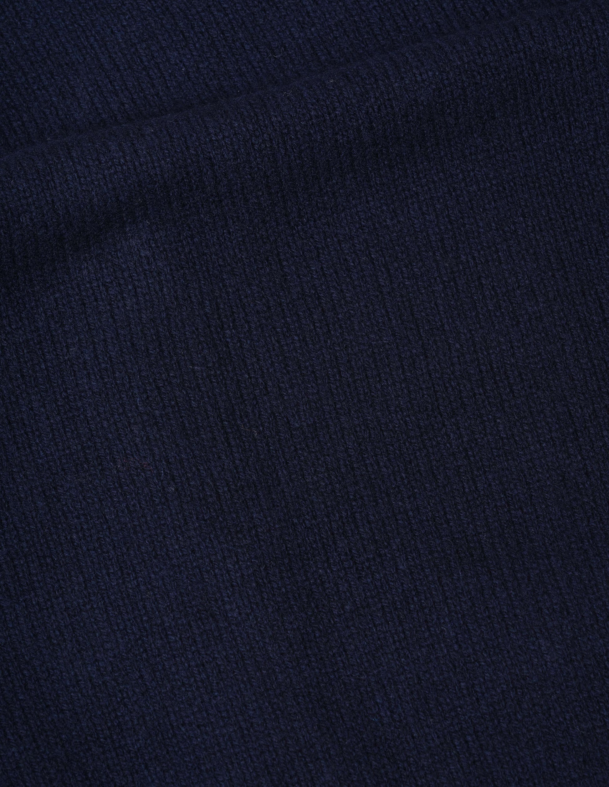 Navy v-neck cardigan lambswool, fabric swatch.