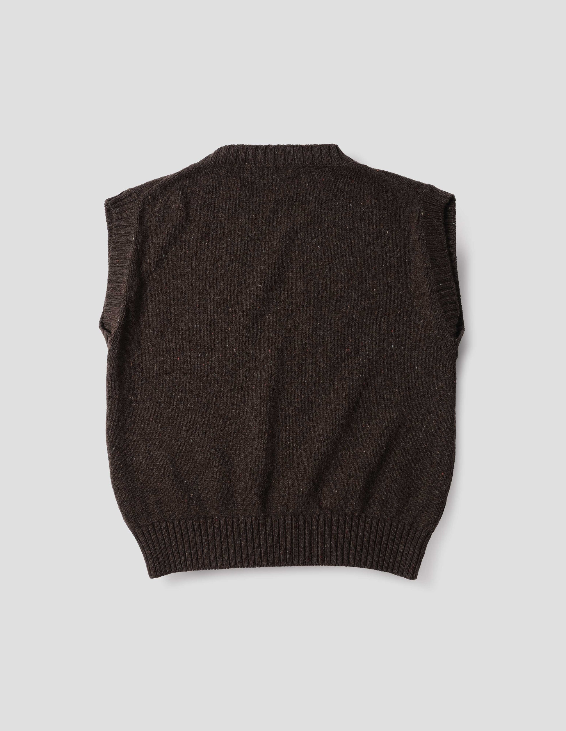 Dark brown boxy slipover with ribbed neck, armhole and hem, back flat lay view.