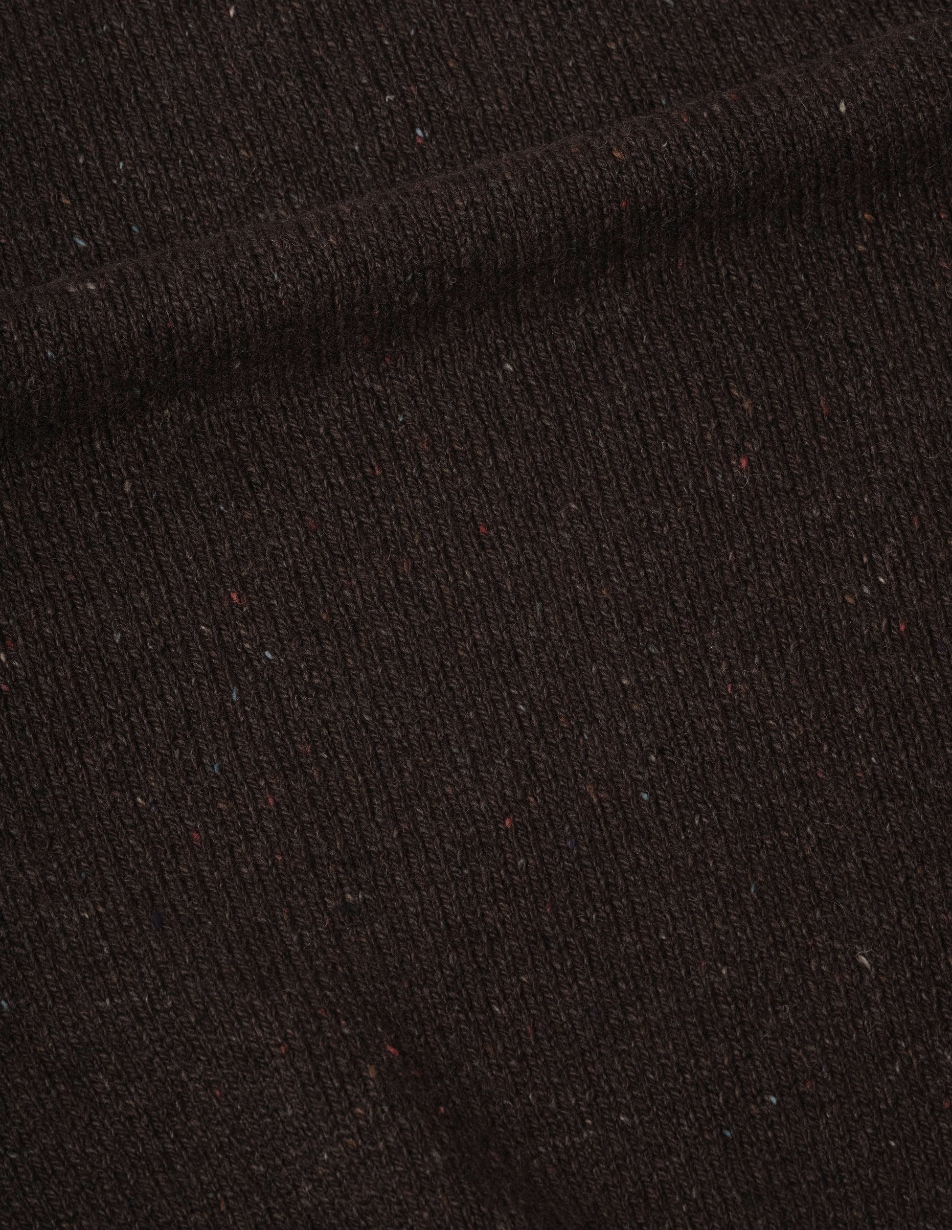 Dark brown cashmere donegal twist slipover fabric swatch.