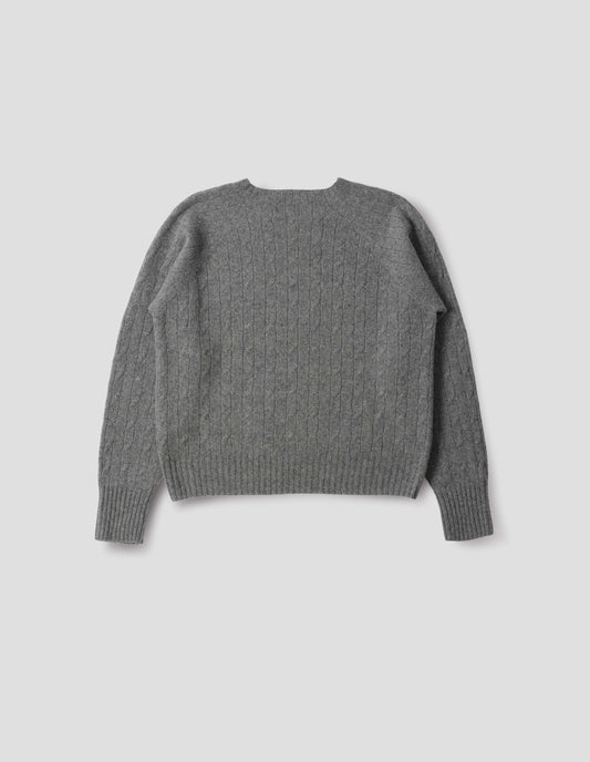 Grey cable knit long sleeve jumper with raglan sleeve and contrast rib on neck, cuffs and hem. Back flat lay view.