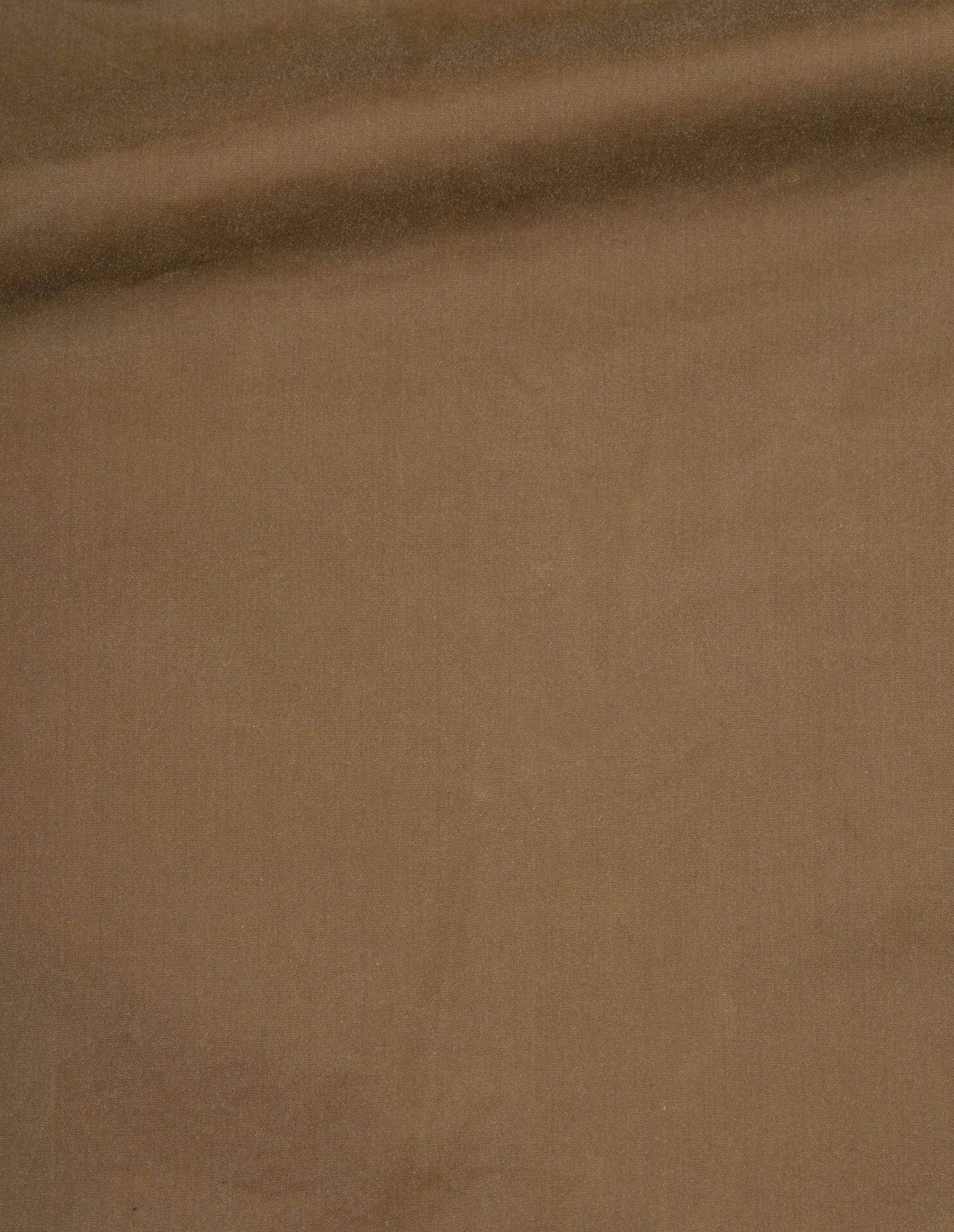 Light brown waxed cotton trench coat fabric swatch.