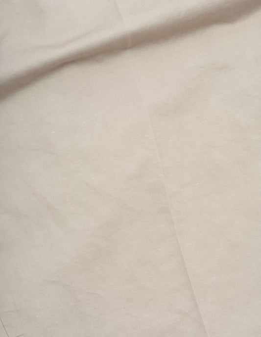 Beige cotton linen twill trousers fabric swatch.