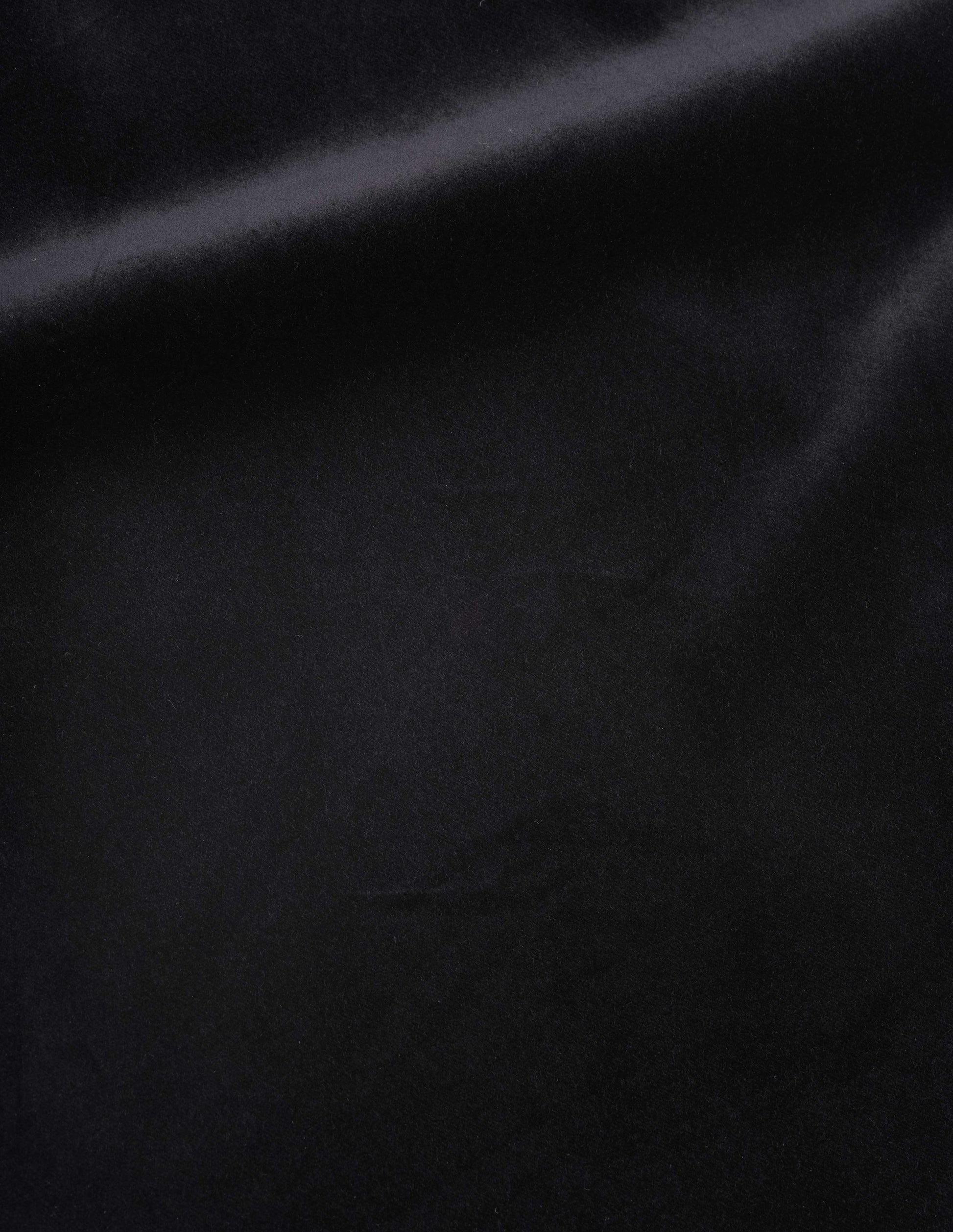 Black rich cotton velvet trousers fabric swatch.