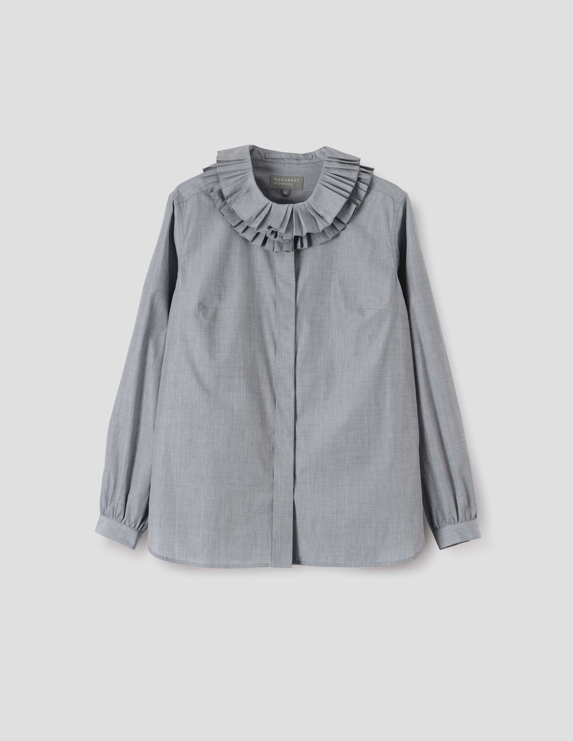 Grey long sleeve shirt with ruffled collar, concealed placket and shirt cuffs. Front flat lay view.