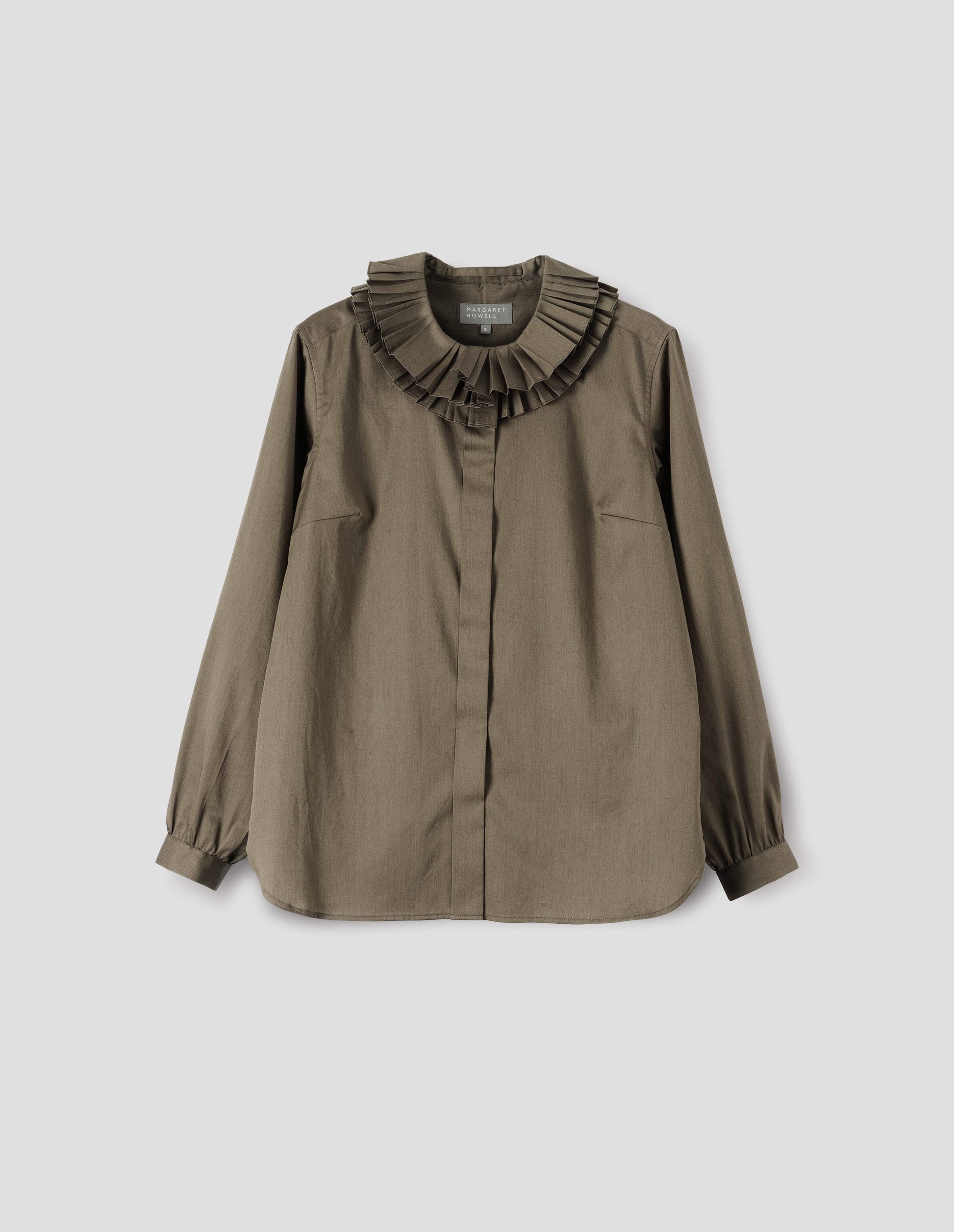 Dark green long sleeve shirt with ruffled collar, concealed placket and shirt cuffs. Front flat lay view.