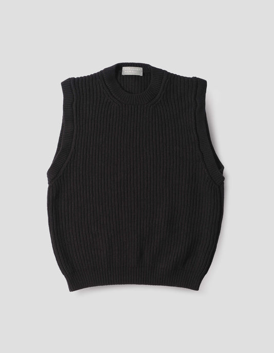 Black sleeveless merino wool slipover, with contrast rib on neck, armhole and hem. Front flat lay view.