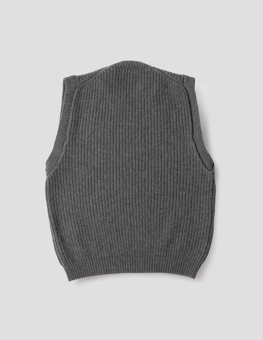 Grey sleeveless merino wool slipover, with contrast rib on neck, armhole and hem. Back flat lay view.