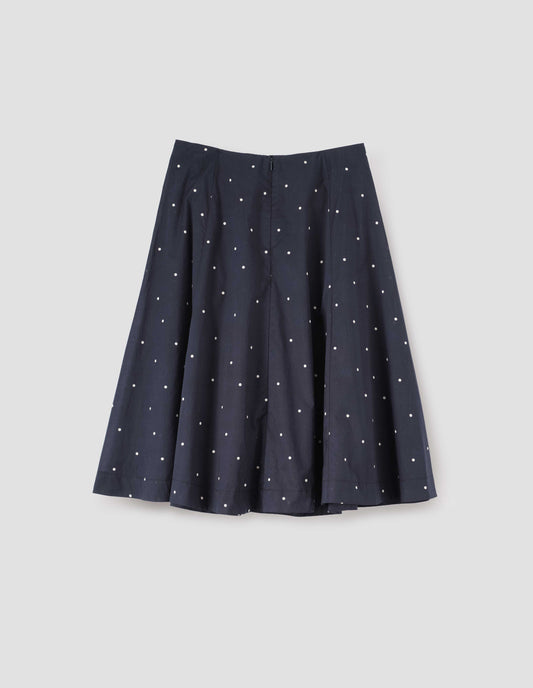 Navy blue and white polka dot flared skirt, with concealed centre back zip fastening. Back flat lay view.