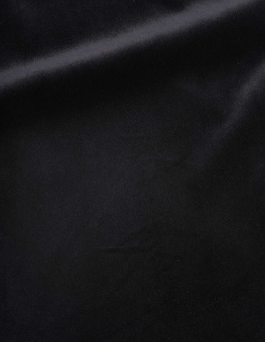 Black rich cotton velvet skirt, fabric swatch.