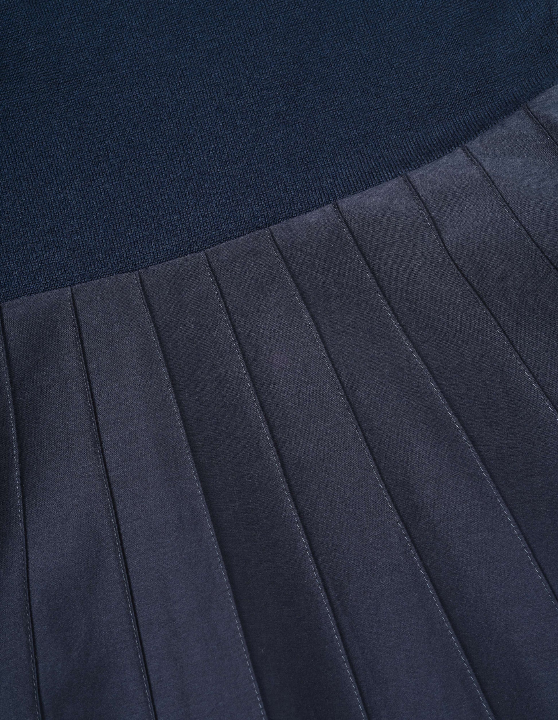 Navy blue dress, knitted merino wool top and cotton silk skirt, fabric swatch.