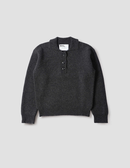 Dark grey knitted polo with corozo brace buttons and contrast rib on collar, placket and cuffs, front flat lay view.