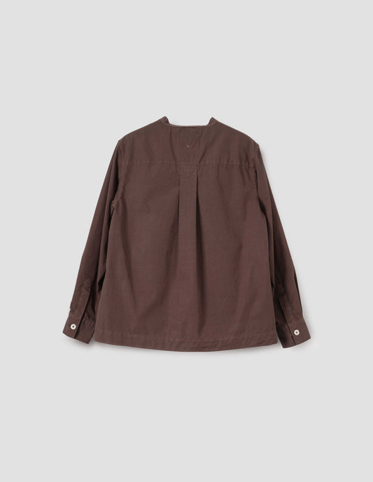 Brown purple collarless long sleeve shirt with box pleat on back yoke and buttonhole detailing on neck band, back flat lay view. 