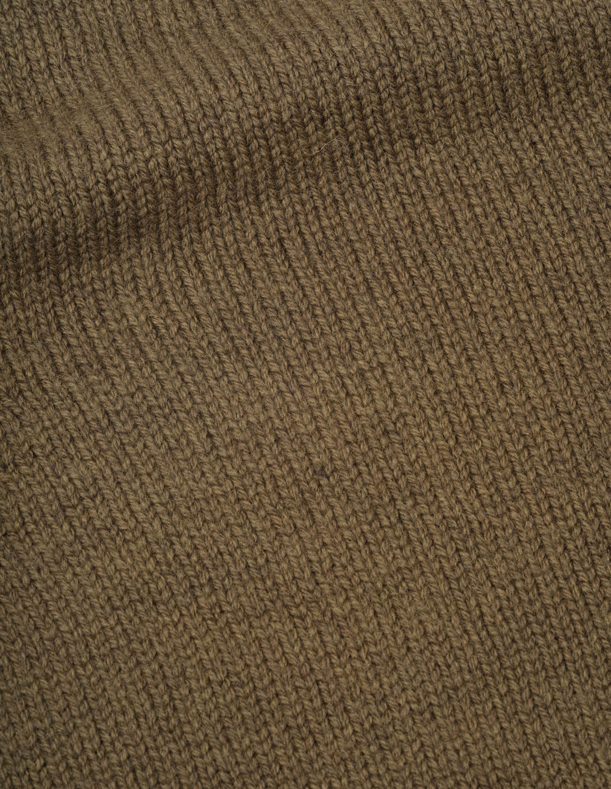Beige green British merino wool knitted slipover, fabric swatch.