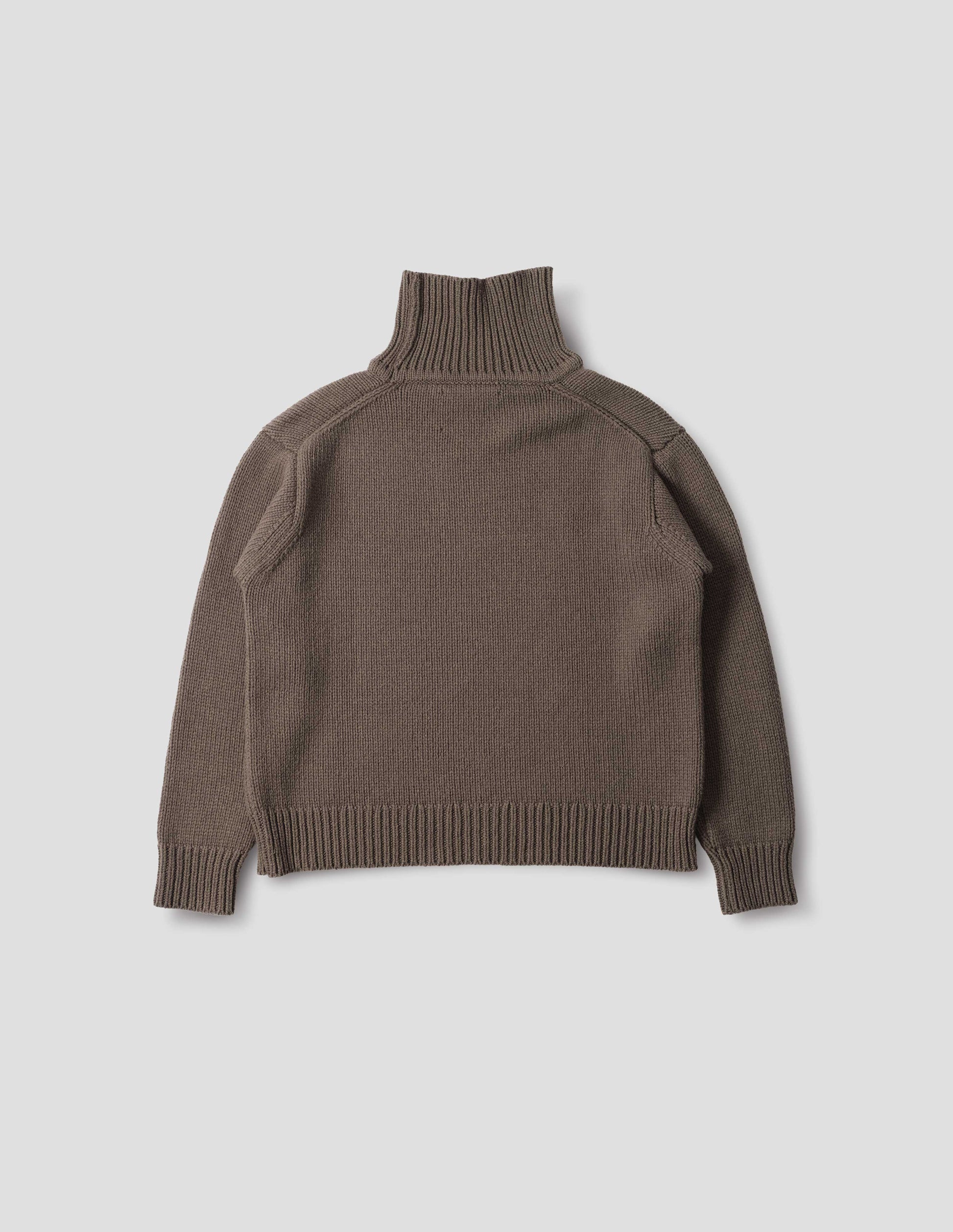 Brown high neck jumper with deep rib trim on neck, cuffs and hem. Back flat lay view.