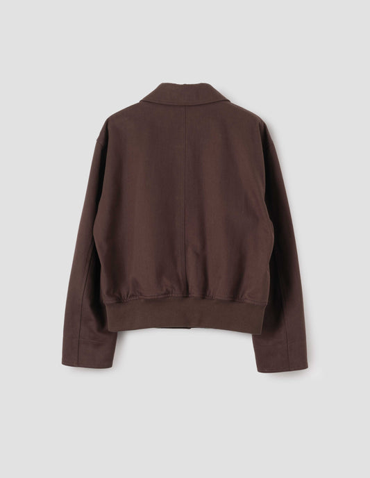 Red brown collared jacket with ribbed hem, back flat lay view.