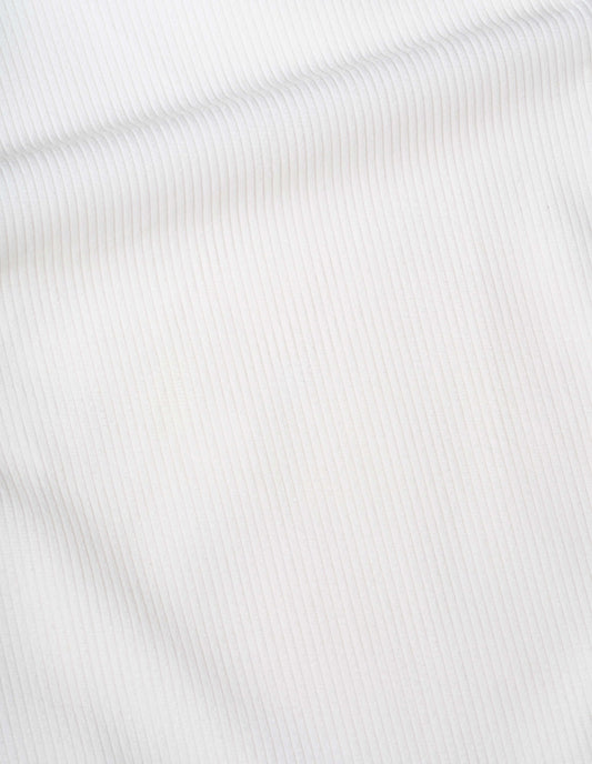 White heavy corduroy trousers, fabric swatch.