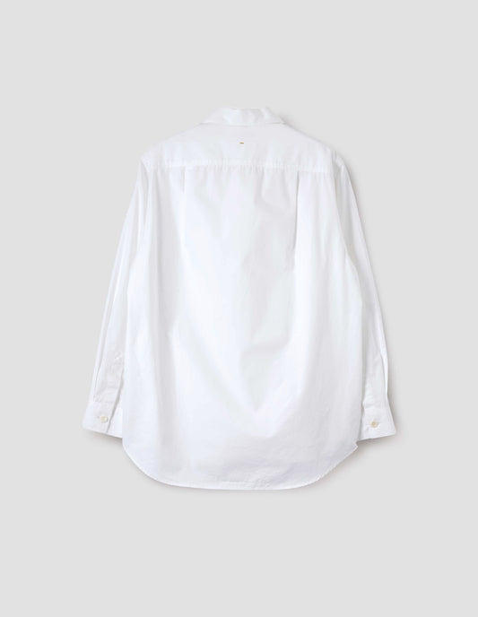 White long sleeve cotton shirt, with corozo button cuffs and elongated hem and pleated back yoke. Back flat lay view.