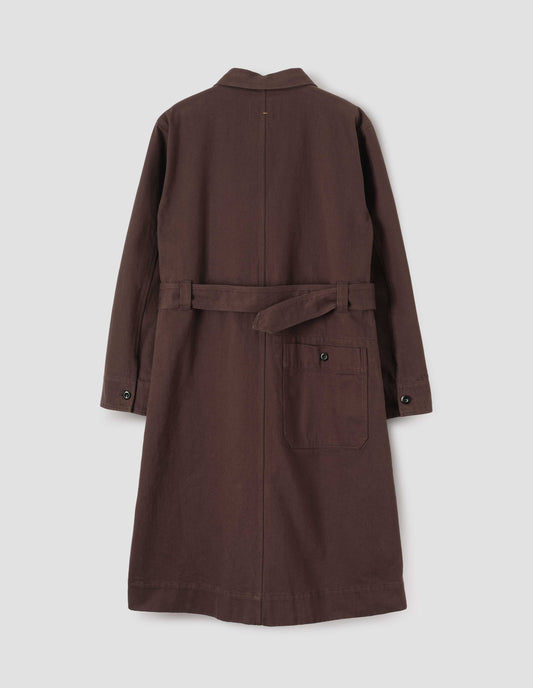Brown red long sleeve shirt dress, patch back pocket, corozo button fastening cuffs and removeable belt. Back flat lay view.