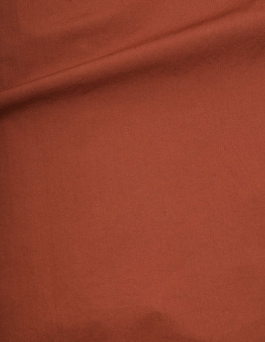 Dark orange washed cotton poplin skirt fabric swatch.