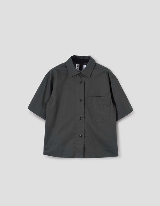 Greenish blue shirt with elbow length sleeves, patch chest pocket and vent split hem. Front flat lay view.